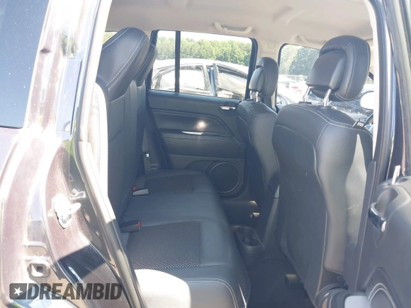 2015 Jeep Compass Latitude with VIN 1C4NJCEBXFD179373, listed as a IAAI auction lot 39380614 with 104,832 mi miles. Bid and sale history available at carsss.com. Image 8.
