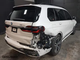 2023 BMW X7 xDrive40i with VIN 5UX23EM04P9P96036, listed as a IAAI auction lot 41235512 with 35,661 mi miles. Bid and sale history available at carsss.com. Image 4.