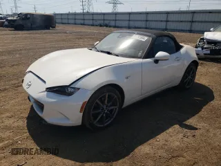2020 Mazda MX-5 Miata Grand Touring z VIN JM1NDAD7XL0412292, wystawiony jako Copart lot #69792894 z przebiegiem 19 513 mil mil oraz Szkoda całkowita • Salvage title. Historia ofert i sprzedaży dostępna na DreamBid. Obrazek 1.