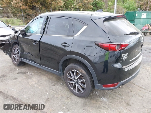 2018 Mazda CX-5 Grand Touring with VIN JM3KFBDM1J0358197, listed as a IAAI auction lot 41967940 with 148,119 mi miles and . Bid and sale history available at DreamBid. Image 3.