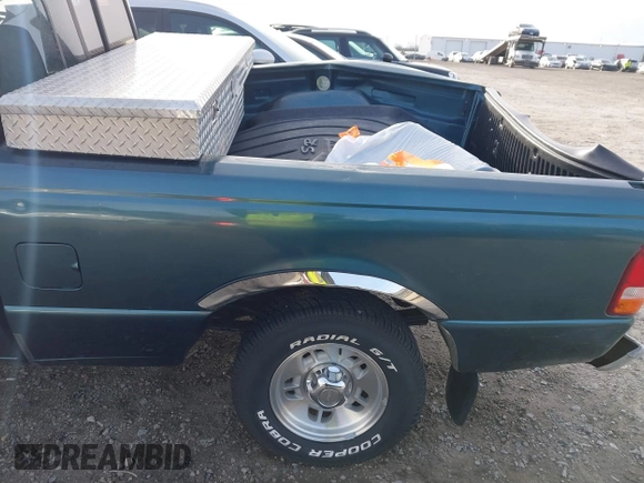1997 Ford Ranger XLT z VIN 1FTCR10A6VUA47101, wystawiony jako IAAI lot #41743587 z przebiegiem 87 277 mil mil oraz . Historia ofert i sprzedaży dostępna na DreamBid. Obrazek 20.
