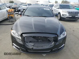 2015 Jaguar XJ with VIN SAJWA2GZ4F8V86379, listed as a Copart auction lot 42624615 with 55,803 mi miles and Salvage Title. Bid and sale history available at carsss.com. Image 5.