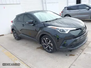 2019 Toyota C-HR XLE with VIN NMTKHMBX2KR094898, listed as a IAAI auction lot 41940883 with 94,351 mi miles. Bid and sale history available at carsss.com. Image 1.