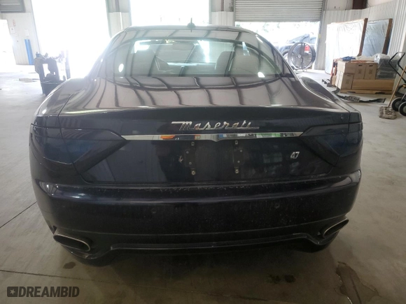 2010 Maserati GranTurismo S with VIN ZAM45KLAXA0050081, listed as a Copart auction lot 69567044 with 87,893 mi miles and Salvage Title. Bid and sale history available at carsss.com. Image 6.