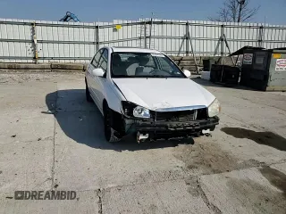 2009 Kia Spectra EX with VIN KNAFE221295654167, listed as a Copart auction lot 53377745 with 131,266 mi miles and Salvage Title. Bid and sale history available at DreamBid. Image 14.