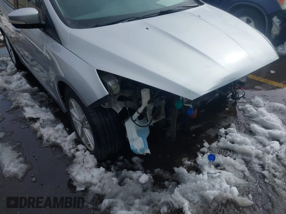 2016 Ford Focus SE with VIN 1FADP3F21GL325603, listed as a IAAI auction lot 41562523 with 97,749 mi miles. Bid and sale history available at carsss.com. Image 6.