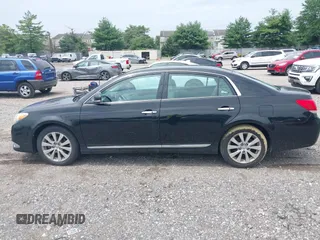 2012 Toyota Avalon with VIN 4T1BK3DB9CU466888, listed as a IAAI auction lot 42712681 with 323,252 mi miles and . Bid and sale history available at DreamBid. Image 14.