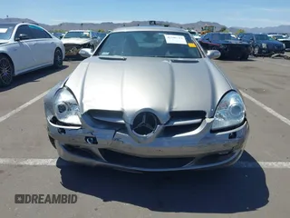 2006 Mercedes-Benz SLK-Class 3.5L with VIN WDBWK56F66F100007, listed as a IAAI auction lot 42108912 with 115,920 mi miles. Bid and sale history available at carsss.com. Image 6.