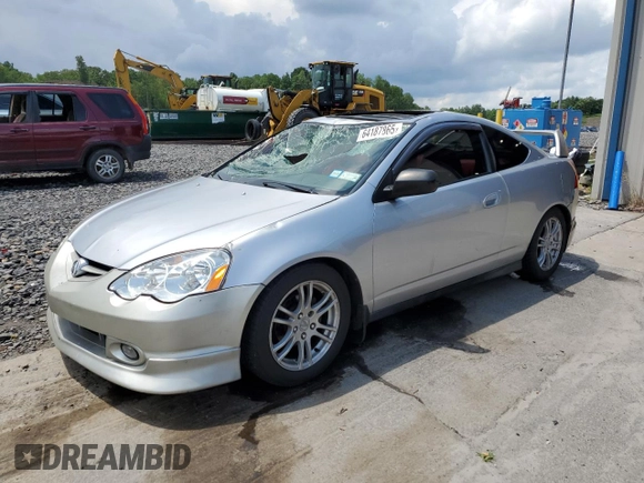2002 Acura RSX Auto with VIN JH4DC54882C011723, listed as a Copart auction lot 64187865 with 106,692 mi miles and Clean title. Bid and sale history available at DreamBid. Image 1.