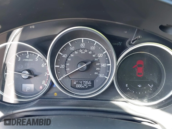 2016 Mazda CX-5 Grand Touring with VIN JM3KE2DY9G0824196, listed as a IAAI auction lot 41801887 with 88,625 mi miles. Bid and sale history available at carsss.com. Image 16.