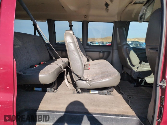 2006 Chevrolet Express Passenger с VIN 1GAHG35U361272100, выставлен на аукционе Copart как лот 80894584 с пробегом 195 675 миль миль и Списание • Salvage title. История ставок и продаж доступна на DreamBid. Изображение 11.