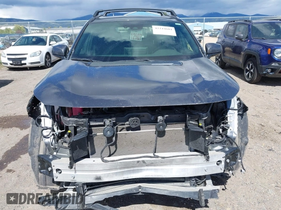 2022 Toyota RAV4 Hybrid SE with VIN JTM16RFV0ND070012, listed as a IAAI auction lot 42244604 with 22,740 mi miles and . Bid and sale history available at DreamBid. Image 13.