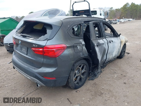2017 BMW X1 sDrive28i with VIN WBXHU7C39H5H36722, listed as a IAAI auction lot 41724022 with 33,412 mi miles. Bid and sale history available at carsss.com. Image 4.