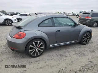 2012 Volkswagen Beetle 2.0T Turbo w/Sun/Snd/Nav PZEV with VIN 3VWVA7AT5CM630812, listed as a Copart auction lot 54419635 with 125,579 mi miles and Clean Title. Bid and sale history available at carsss.com. Image 3.