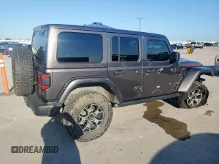 2018 Jeep Wrangler Unlimited Rubicon z VIN 1C4HJXFN3JW236121, wystawiony jako Copart lot #60930565 z przebiegiem 128 727 mil mil oraz Szkoda całkowita • Salvage title. Historia ofert i sprzedaży dostępna na DreamBid. Obrazek 3.