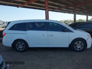 2012 Honda Odyssey EX-L with VIN 5FNRL5H67CB051764, listed as a IAAI auction lot 42493181 with 167,189 mi miles and . Bid and sale history available at DreamBid. Image 13.