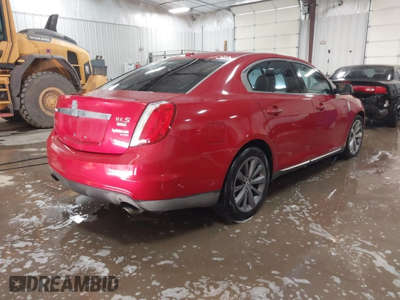 2009 Lincoln MKS with VIN 1LNHM94R59G610559, listed as a IAAI auction lot 41704552 with 168,556 mi miles. Bid and sale history available at carsss.com. Image 4.