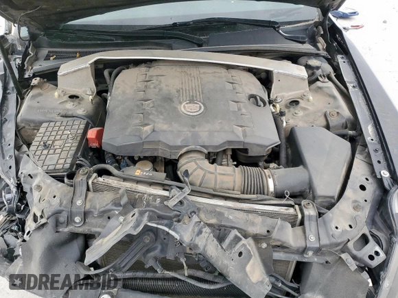 2012 Cadillac CTS z VIN 1G6DA5E54C0100982, wystawiony jako Copart lot #51357945 z przebiegiem 100 798 mil mil oraz Szkoda całkowita • Salvage title. Historia ofert i sprzedaży dostępna na DreamBid. Obrazek 13.