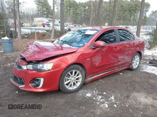 2016 Mitsubishi Lancer SE with VIN JA32V2FW7GU004159, listed as a IAAI auction lot 41401386 with 100,536 mi miles. Bid and sale history available at carsss.com. Image 16.
