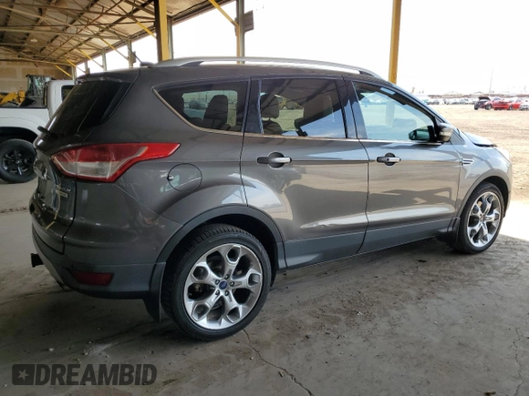 2014 Ford Escape Titanium с VIN 1FMCU0J91EUA21918, выставлен на аукционе Copart как лот 59161865 с пробегом 118 003 миль миль и Списание • Salvage title. История ставок и продаж доступна на DreamBid. Изображение 3.