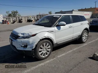 2015 Land Rover Range Rover Evoque Prestige with VIN SALVV2BGXFH958725, listed as a Copart auction lot 74386694 with 121,555 mi miles and Salvage title. Bid and sale history available at DreamBid. Image 1.