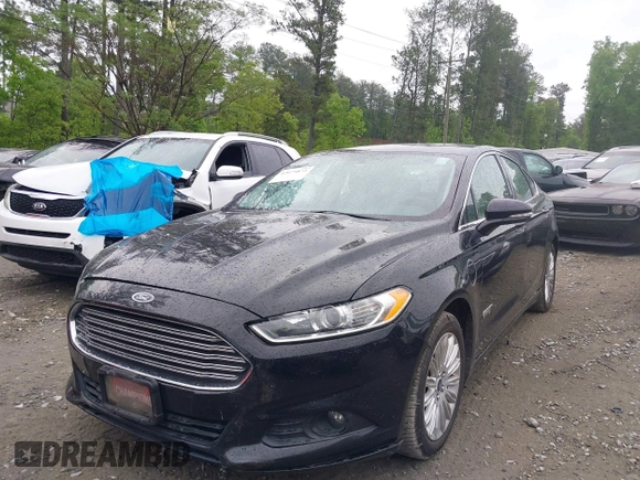 2016 Ford Fusion Energi SE Luxury with VIN 3FA6P0PU7GR293099, listed as a IAAI auction lot 42079873 with 194,755 mi miles. Bid and sale history available at carsss.com. Image 2.