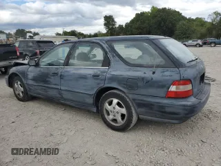 1995 Honda Accord EX with VIN 1HGCE1898SA012385, listed as a Copart auction lot 71621214 with 220,046 mi miles and Salvage Title. Bid and sale history available at carsss.com. Image 2.