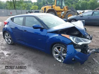 2016 Hyundai Veloster z VIN KMHTC6AD5GU248445, wystawiony jako IAAI lot #42286645 z przebiegiem 101 373 mil mil oraz . Historia ofert i sprzedaży dostępna na DreamBid. Obrazek 1.