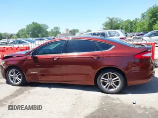 2016 Ford Fusion SE Hybrid with VIN 3FA6P0LU3GR143688, listed as a IAAI auction lot 42269789 with 163,910 mi miles and . Bid and sale history available at DreamBid. Image 14.