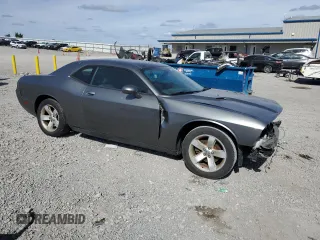 2011 Dodge Challenger z VIN 2B3CJ4DG9BH570202, wystawiony jako Copart lot #73284844 z przebiegiem 217 850 mil mil oraz Szkoda całkowita • Salvage title. Historia ofert i sprzedaży dostępna na DreamBid. Obrazek 4.
