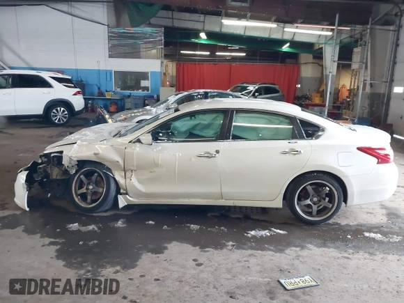 2016 Nissan Altima SR with VIN 1N4AL3AP1GC174425, listed as a IAAI auction lot 41177401 with 173,374 mi miles and . Bid and sale history available at DreamBid. Image 13.