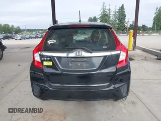 2015 Honda Fit EX-L z VIN 3HGGK5H81FM701122, wystawiony jako IAAI lot #42610165 z przebiegiem 74 969 mil mil oraz . Historia ofert i sprzedaży dostępna na DreamBid. Obrazek 17.
