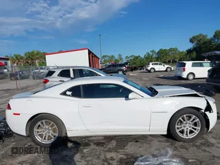 2014 Chevrolet Camaro LT z VIN 2G1FB1E32E9305387, wystawiony jako IAAI lot #42406536 z przebiegiem 129 121 mil mil oraz . Historia ofert i sprzedaży dostępna na DreamBid. Obrazek 14.