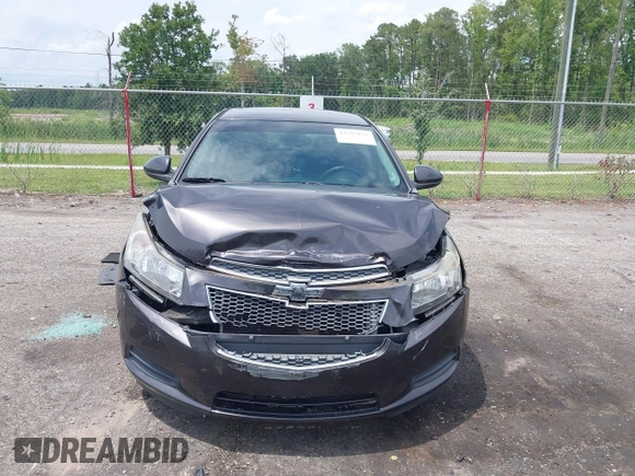 2014 Chevrolet Cruze 1LT z VIN 1G1PC5SBXE7178264, wystawiony jako IAAI lot #42387875 z przebiegiem 125 437 mil mil oraz . Historia ofert i sprzedaży dostępna na DreamBid. Obrazek 12.
