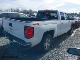 2018 Chevrolet Silverado 1500 LT with VIN 1GCVKREC6JZ266420, listed as a IAAI auction lot 41660687 with 86,656 mi miles. Bid and sale history available at carsss.com. Image 4.