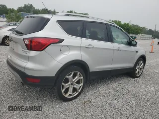 2019 Ford Escape Titanium with VIN 1FMCU9J90KUA07976, listed as a Copart auction lot 59565275 with 189,655 mi miles and Salvage title. Bid and sale history available at DreamBid. Image 3.