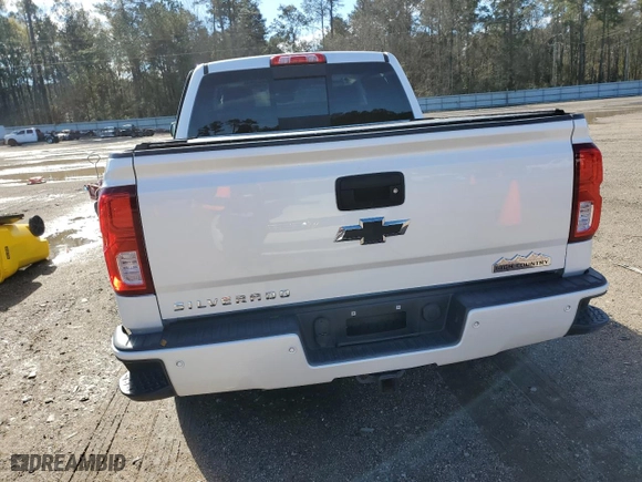 2017 Chevrolet Silverado 1500 High Country with VIN 3GCUKTEC4HG388812, listed as a Copart auction lot 87274274 with 101,729 mi miles and Salvage Title. Bid and sale history available at carsss.com. Image 6.