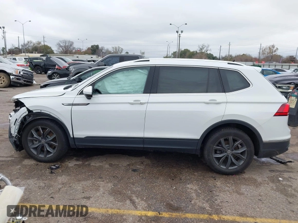 2022 Volkswagen Tiguan SE with VIN 3VV3B7AX0NM161398, listed as a IAAI auction lot 41290692 with 47,970 mi miles and . Bid and sale history available at DreamBid. Image 14.