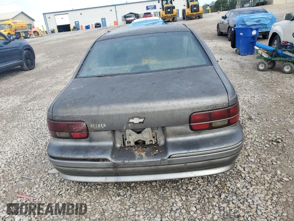 1992 Chevrolet Caprice z VIN 1G1BN53E5NW120694, wystawiony jako Copart lot #73438584 z przebiegiem 156 839 mil mil oraz Czysty tytuł • Clean title. Historia ofert i sprzedaży dostępna na DreamBid. Obrazek 6.