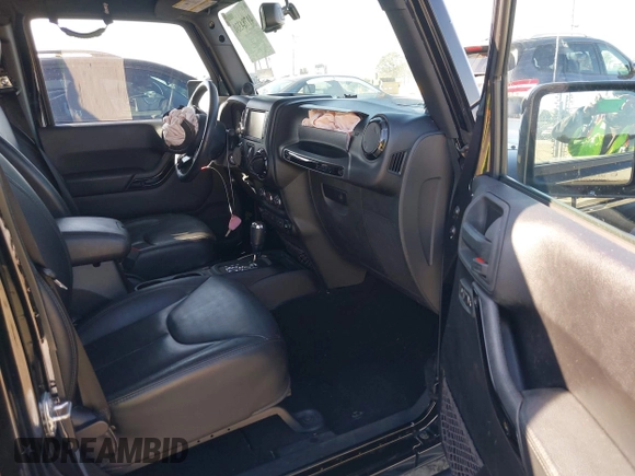 2014 Jeep Wrangler Unlimited Sahara with VIN 1C4BJWEG0EL306202, listed as a IAAI auction lot 41784330 with 79,123 mi miles. Bid and sale history available at carsss.com. Image 5.