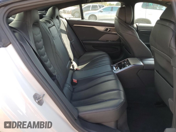 2023 BMW 8 Series 840i with VIN WBAGV4C01PCL65666, listed as a Copart auction lot 47543754 with 31,703 mi miles and . Bid and sale history available at DreamBid. Image 10.