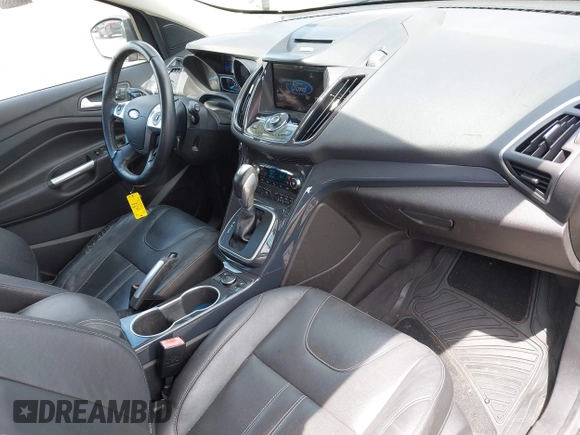 2013 Ford Escape Titanium z VIN 1FMCU9J93DUC06684, wystawiony jako IAAI lot #42606418 z przebiegiem 109 270 mil mil oraz . Historia ofert i sprzedaży dostępna na DreamBid. Obrazek 5.