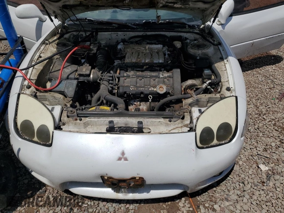 1998 Mitsubishi 3000GT GT z VIN JA3AM84J7WY003884, wystawiony jako Copart lot #59136565 z przebiegiem 274 171 mil mil oraz Tytuł czysty. Historia ofert i sprzedaży dostępna na DreamBid. Obrazek 11.