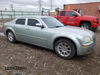 2005 Chrysler 300 with VIN 2C3JA43R85H554154, listed as a Copart auction lot 54252234 with 182,740 mi miles and Salvage Title. Bid and sale history available at carsss.com. Image 4.