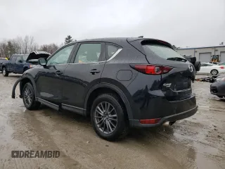 2019 Mazda CX-5 Sport with VIN JM3KFBBM1K0519345, listed as a Copart auction lot 50232985 with 157,792 mi miles and Salvage Title. Bid and sale history available at DreamBid. Image 2.