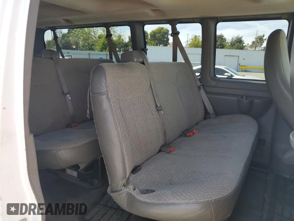 2015 Chevrolet Express Passenger LT with VIN 1GAZG1FG7F1115655, listed as a Copart auction lot 52825575 with 168,167 mi miles and Clean title. Bid and sale history available at DreamBid. Image 11.