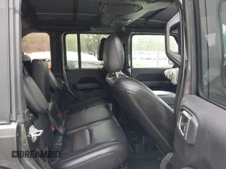 2021 Jeep Wrangler Unlimited Sahara with VIN 1C4JJXP60MW704738, listed as a IAAI auction lot 42042079 with 63,765 mi miles and . Bid and sale history available at DreamBid. Image 8.