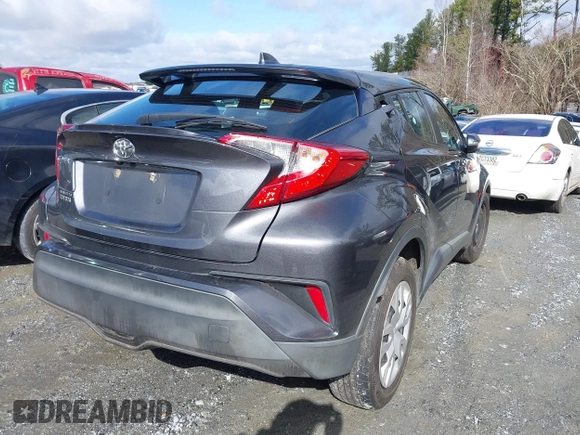 2021 Toyota C-HR LE with VIN NMTKHMBX9MR128998, listed as a IAAI auction lot 41575235 with 96,908 mi miles. Bid and sale history available at carsss.com. Image 4.