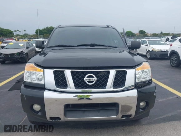 2014 Nissan Titan Pro-4X with VIN 1N6BA0EC1EN515685, listed as a IAAI auction lot 42423258 with 137,012 mi miles and . Bid and sale history available at DreamBid. Image 12.