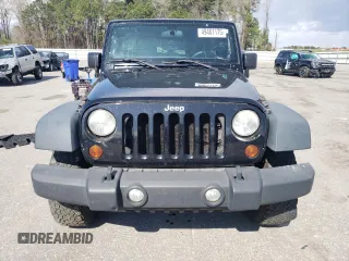 2013 Jeep Wrangler Unlimited Freedom z VIN 1C4BJWDGXDL702914, wystawiony jako Copart lot #49461175 z przebiegiem 191 610 mil mil oraz Czysty tytuł • Clean title. Historia ofert i sprzedaży dostępna na DreamBid. Obrazek 5.